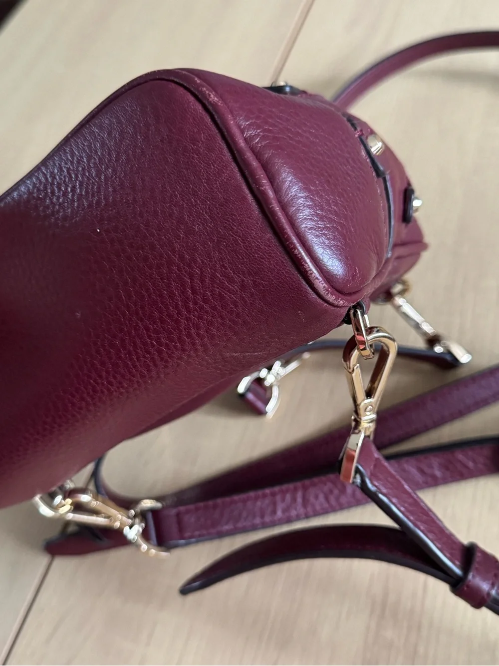Michael Kors Burgundy Pebbled Leather Mini Backpack with Gold Hardware